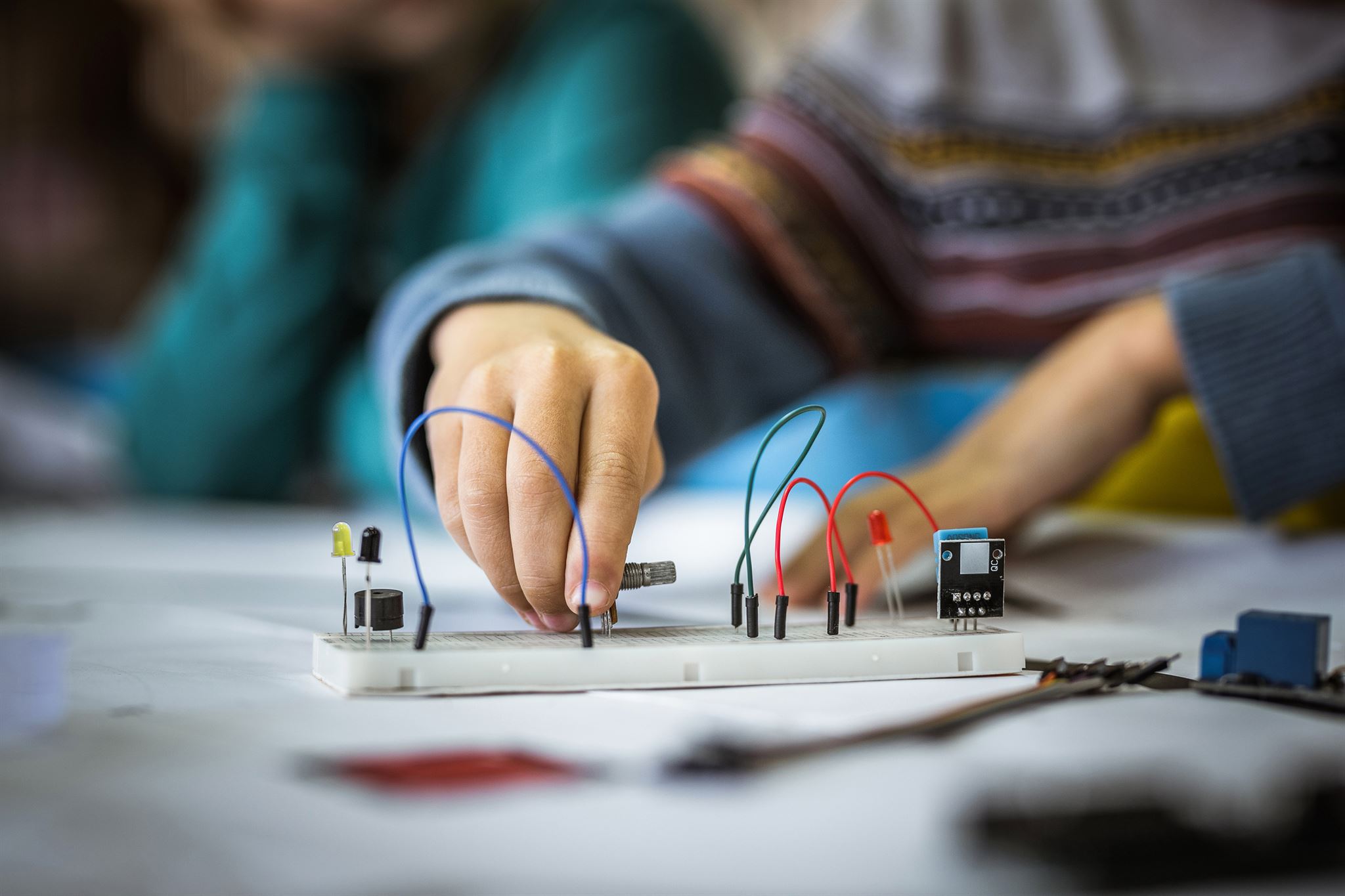 Hands-repairing-computer-tech-component